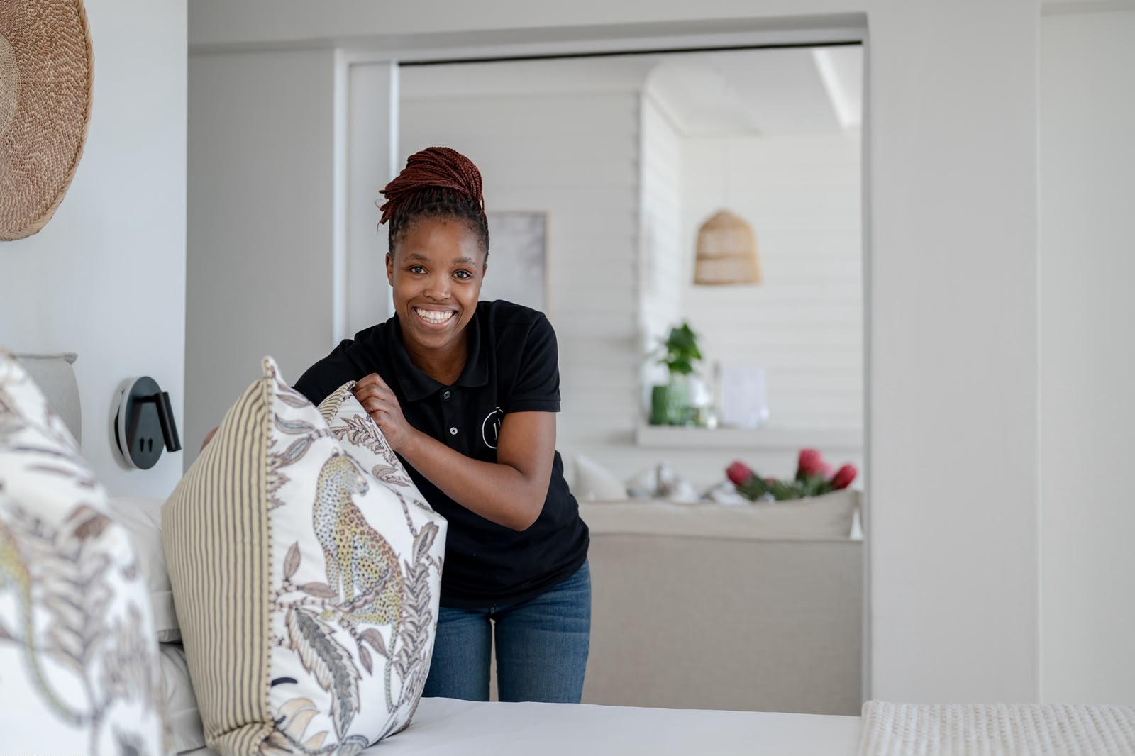 A member of the Eleven team preparing a suite
